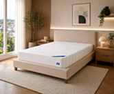 Matelas Sensospring 160x200 cm Oli posé sur un lit 2 personne dans une chambre moderne – confort équilibré à ressorts ensachés