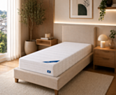 Matelas Sensospring 90x190 cm Oli posé sur un lit 1 personne dans une chambre moderne – confort équilibré à ressorts ensachés